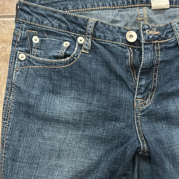 Dark mid rise boot cut jeans with asymmetrical outside hem size 8 - Picture 2 of 5